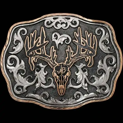 A custom hunting betl buckle for men featuring a deer skull with a ranch brand 